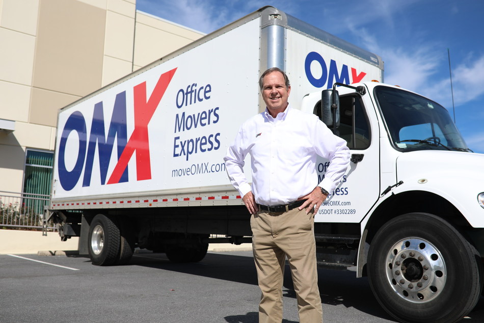 Jim Durfee in front of OMX truck