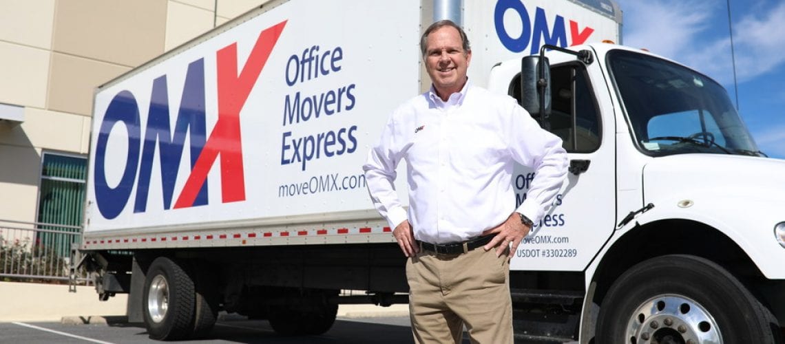 Jim Durfee in front of OMX truck